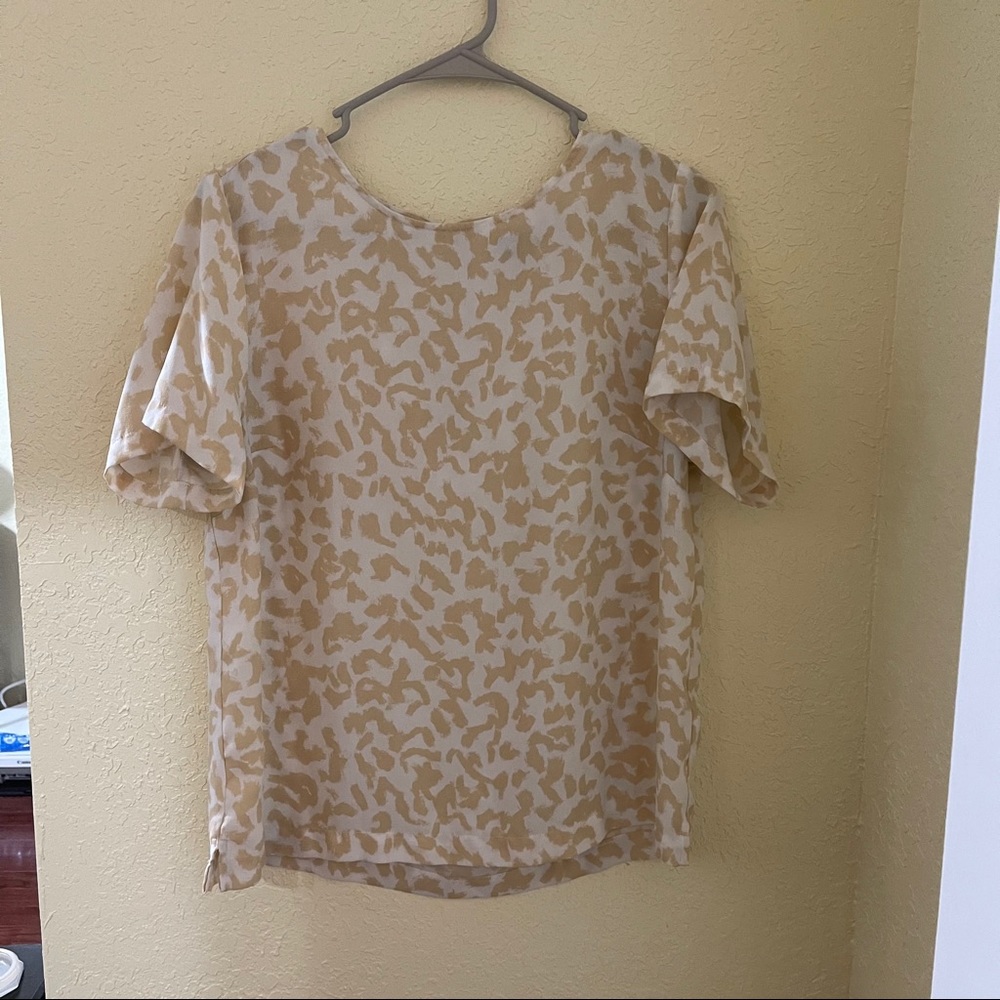 A new day Cheetah tan and white top